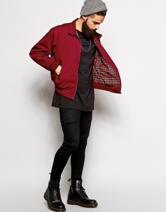 a male model wearing a red jacket  with a black shirt and a black pant